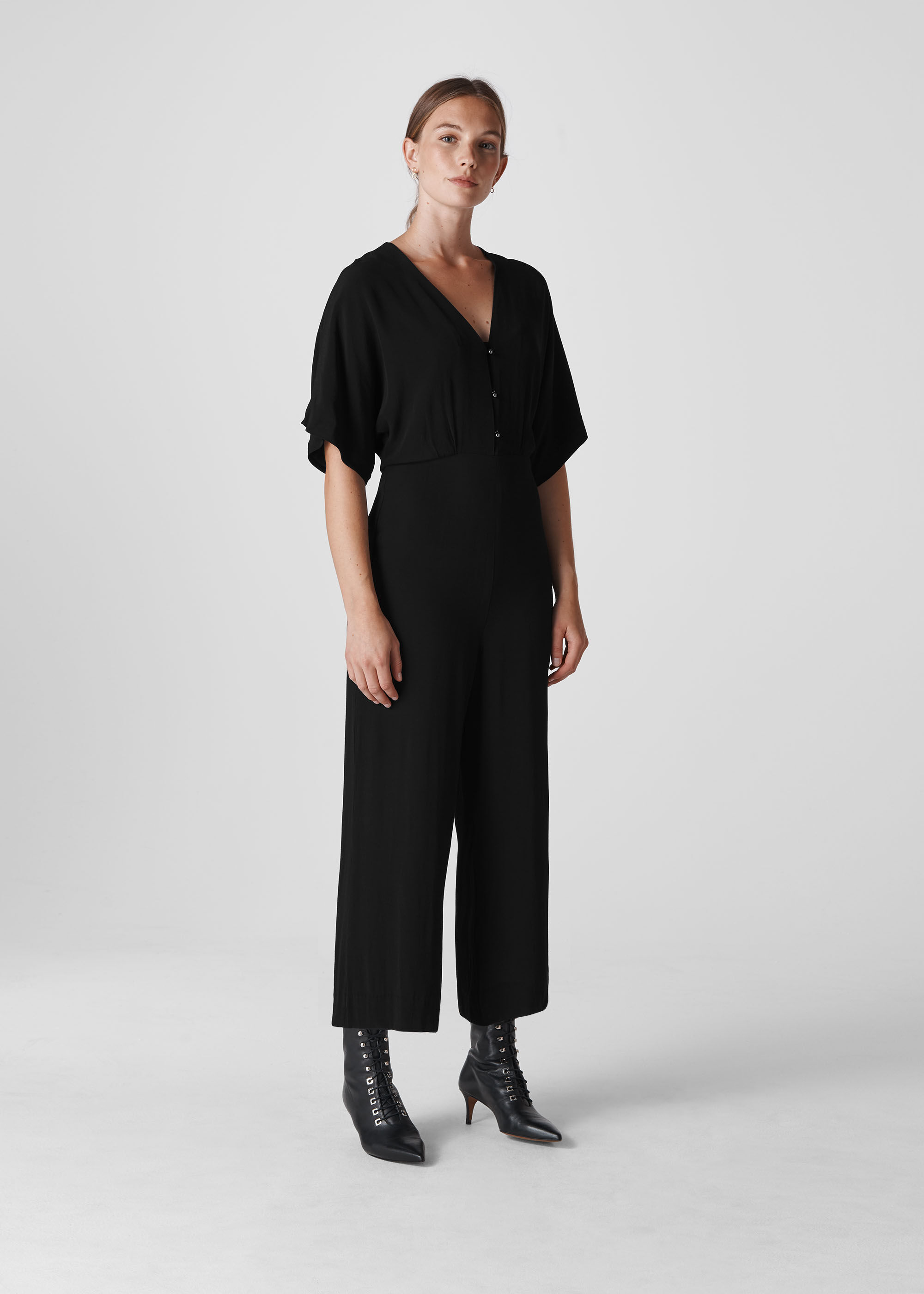 Black button jumpsuit sales
