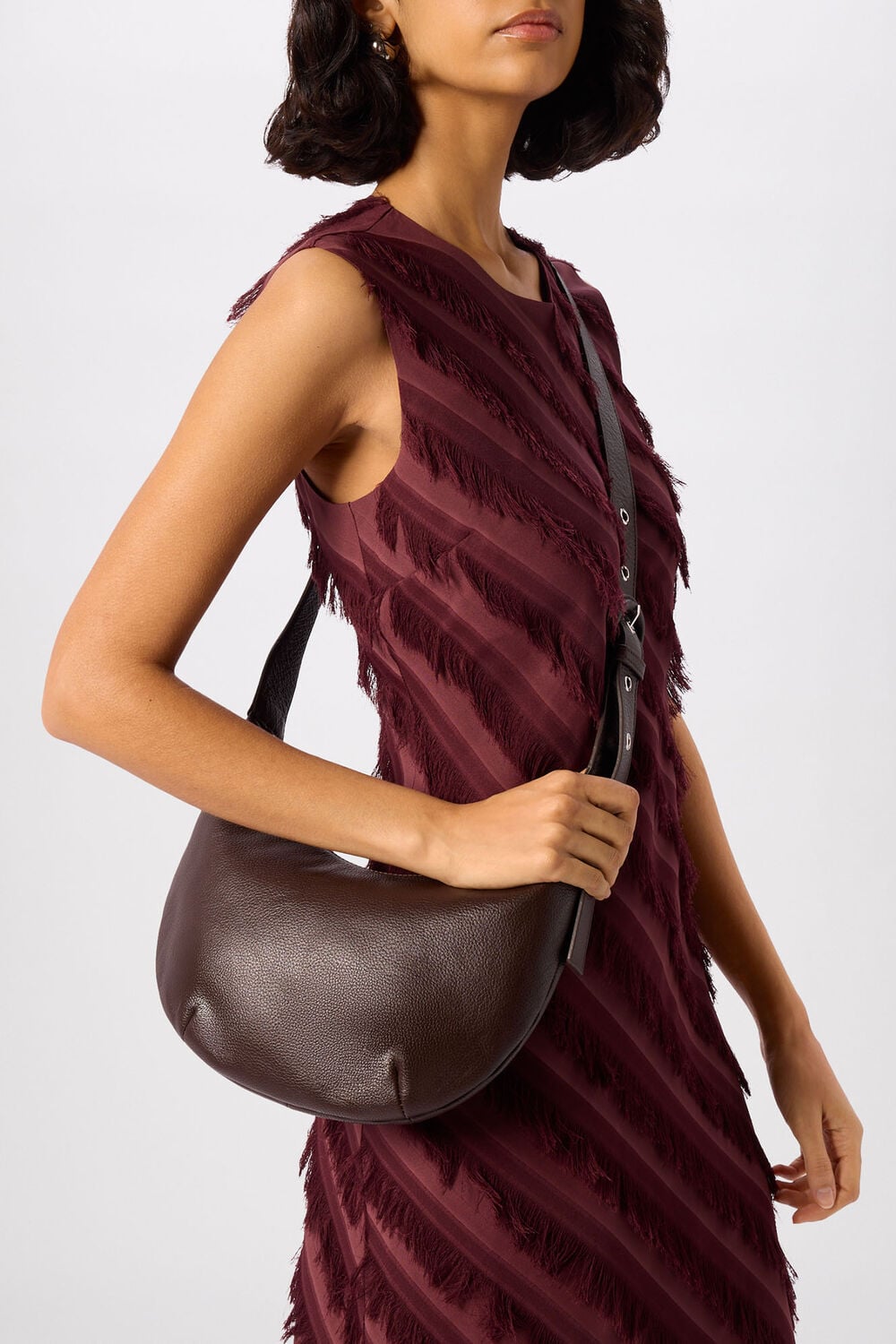 Chocolate Small Sia Curved Crossbody Bag