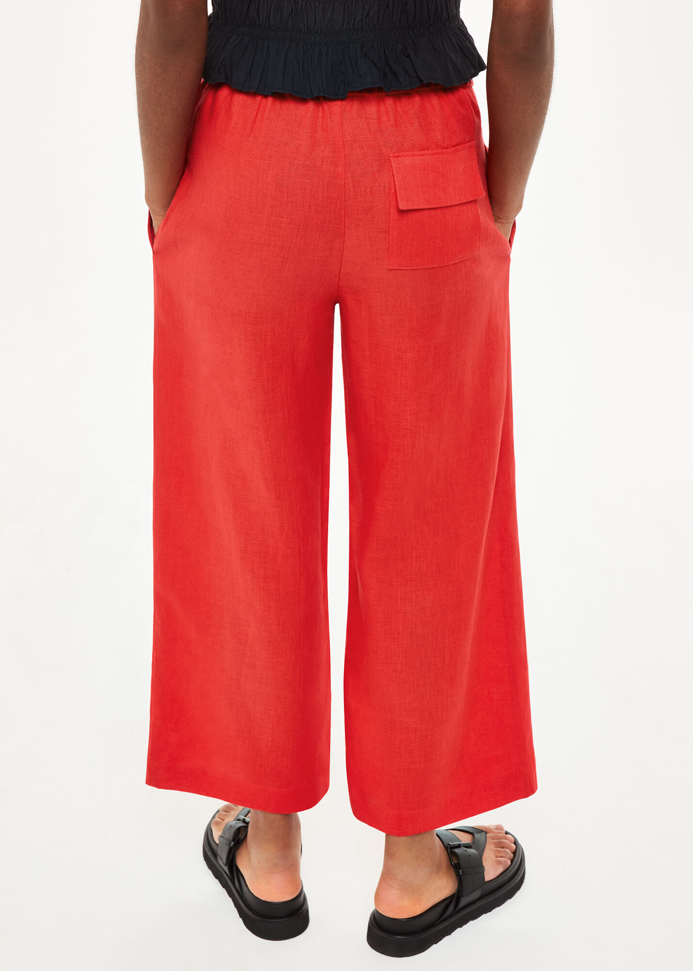 Red trousers website top