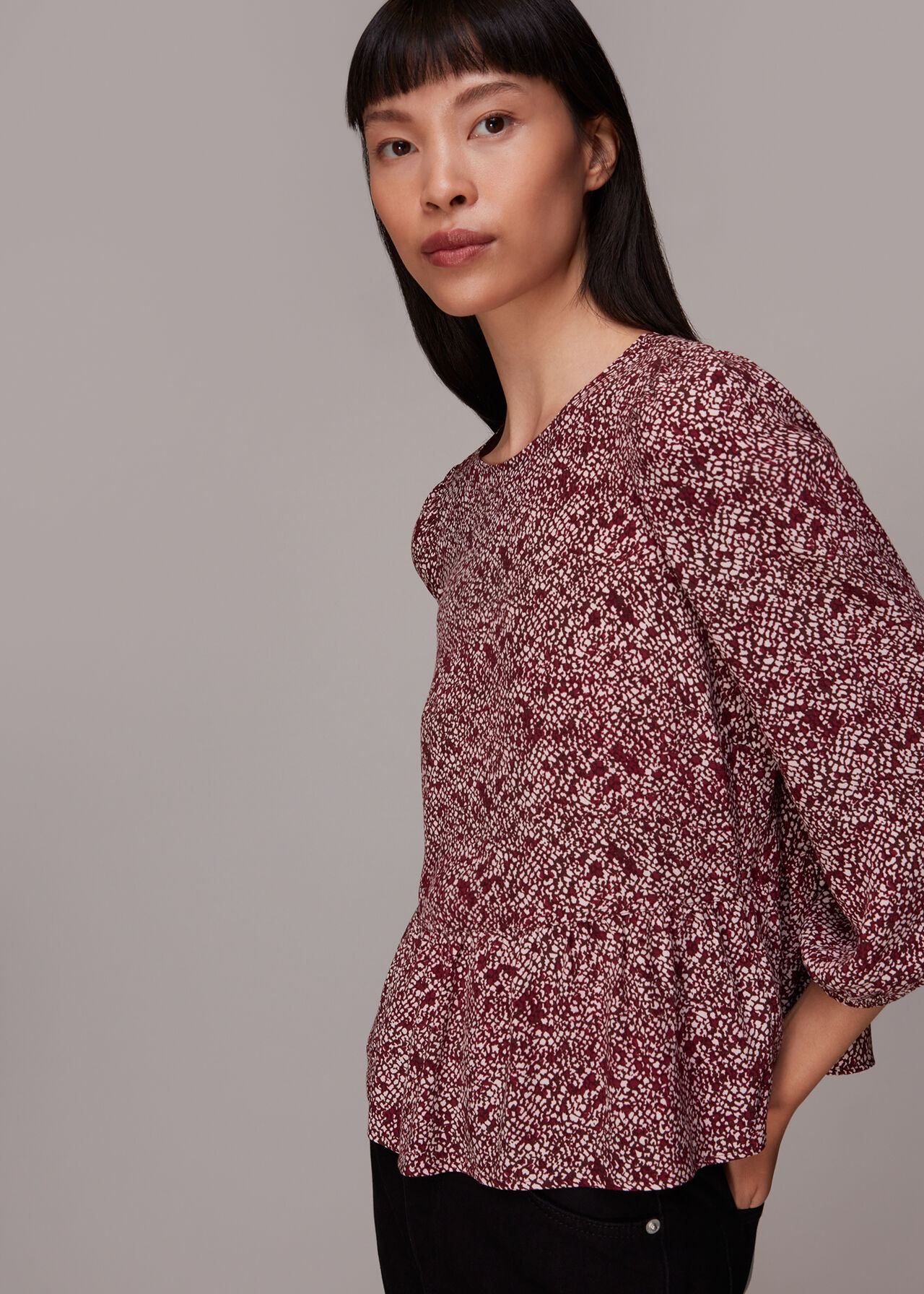 Rough Weave Cut Out Peplum Top