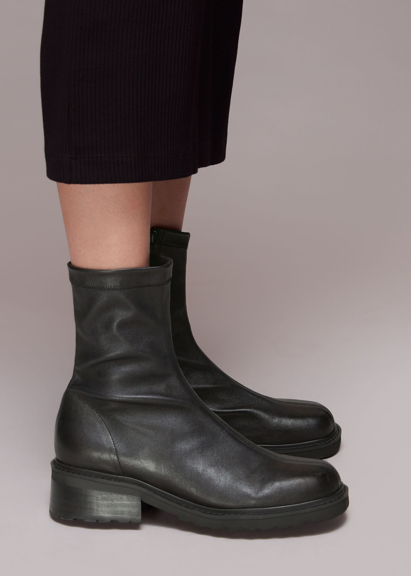 Black leather sock top boots