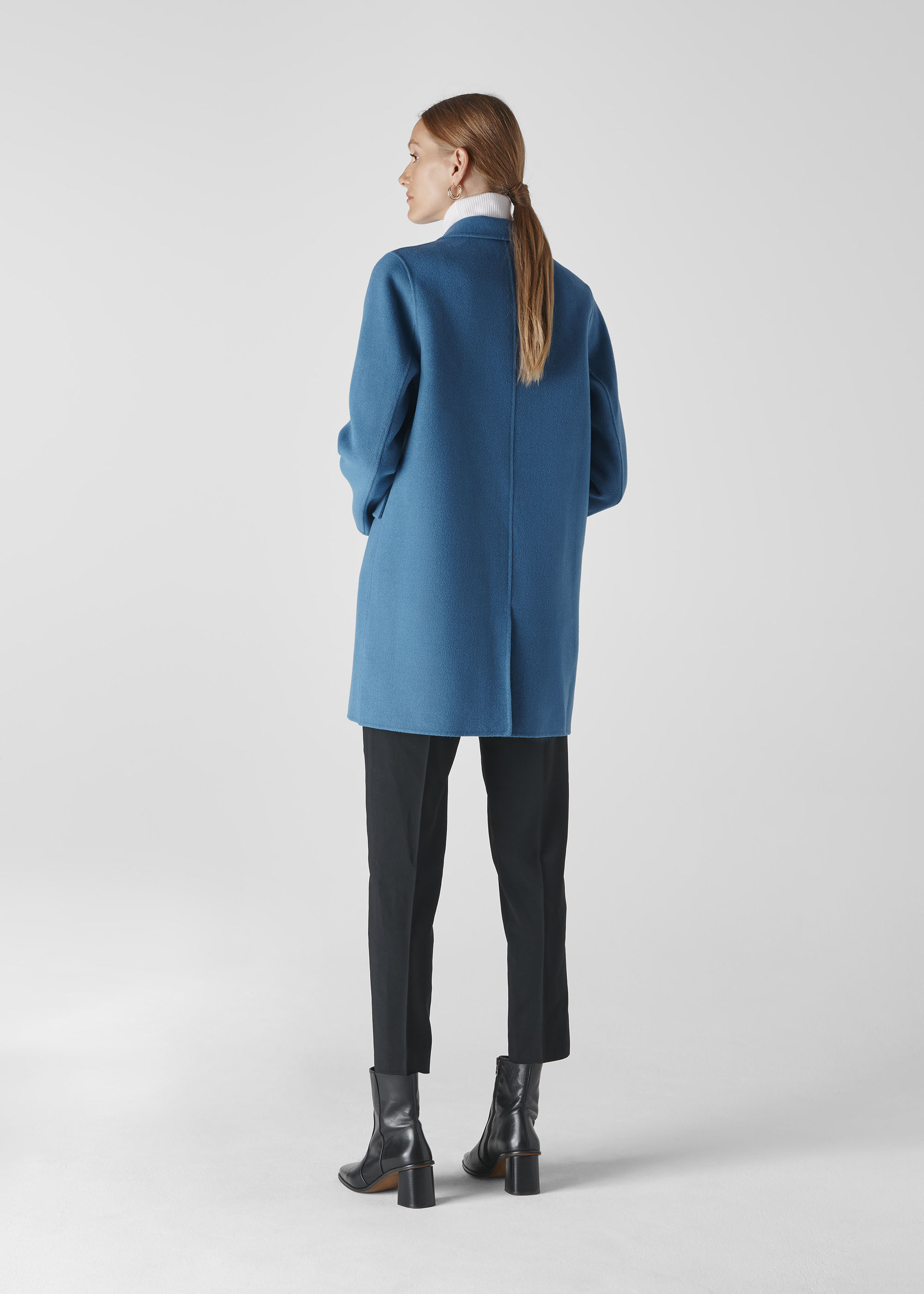 Turquoise wool coat top