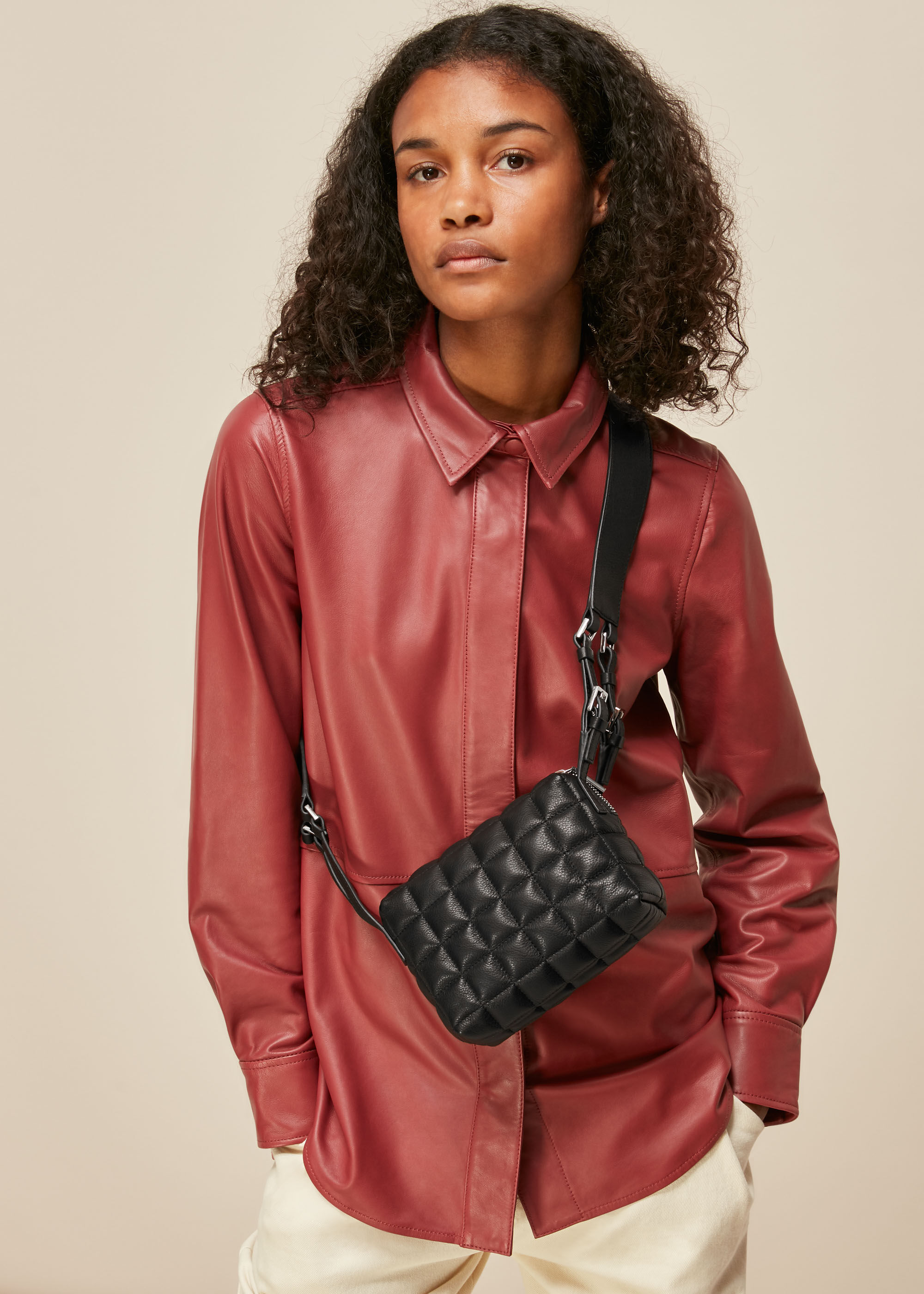 Quilted cross store body bag