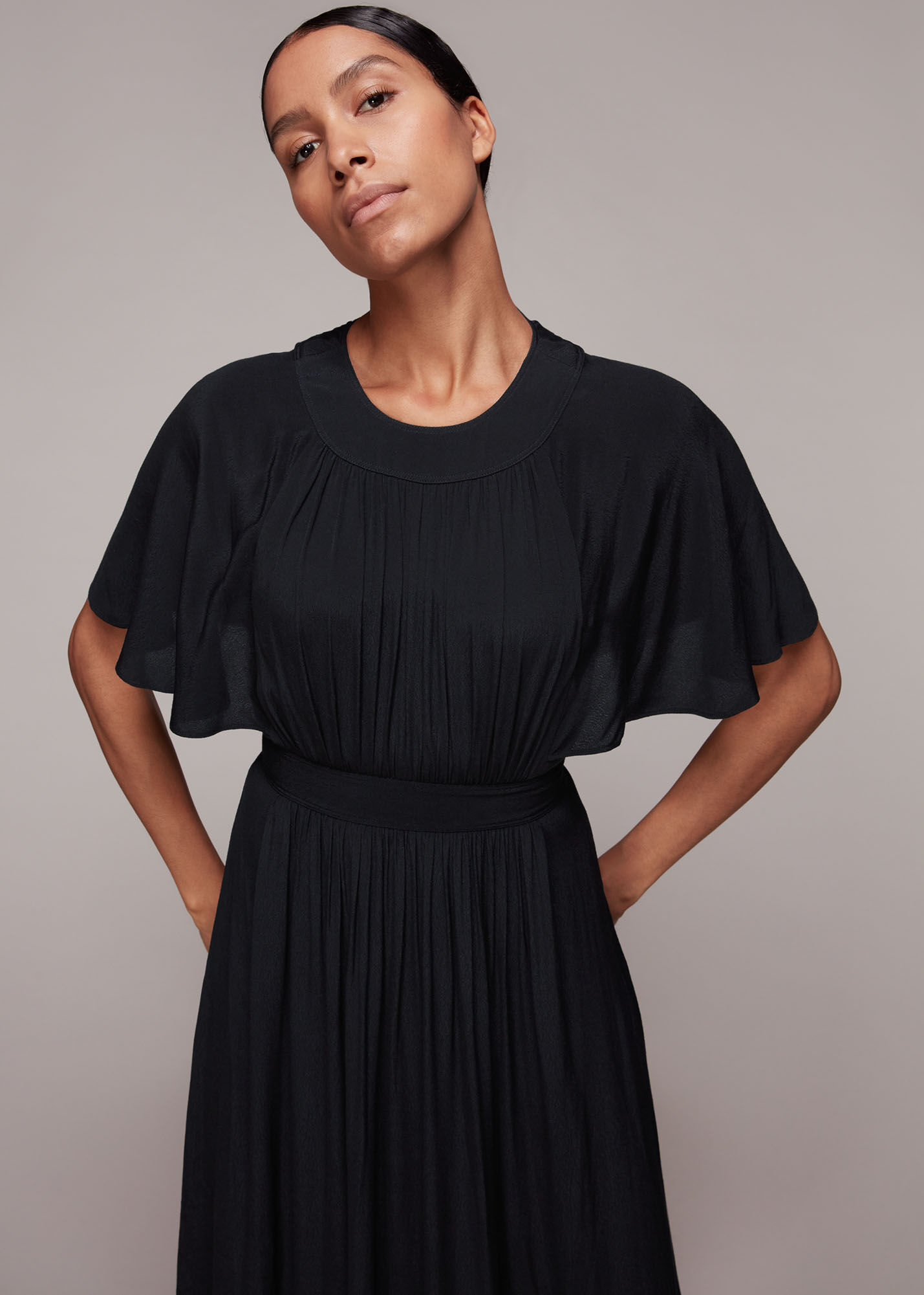 black cape sleeve dress