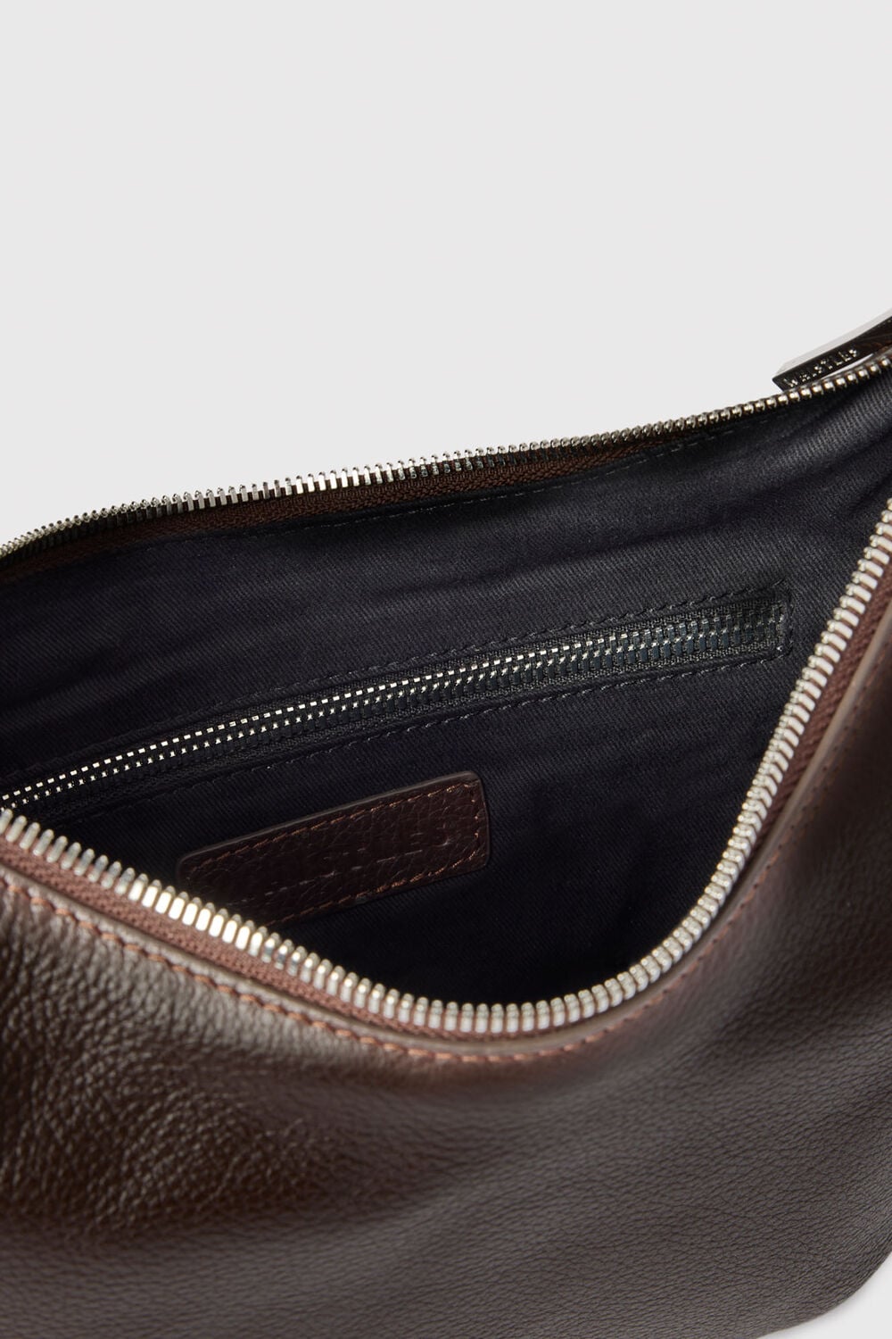 Chocolate Small Sia Curved Crossbody Bag