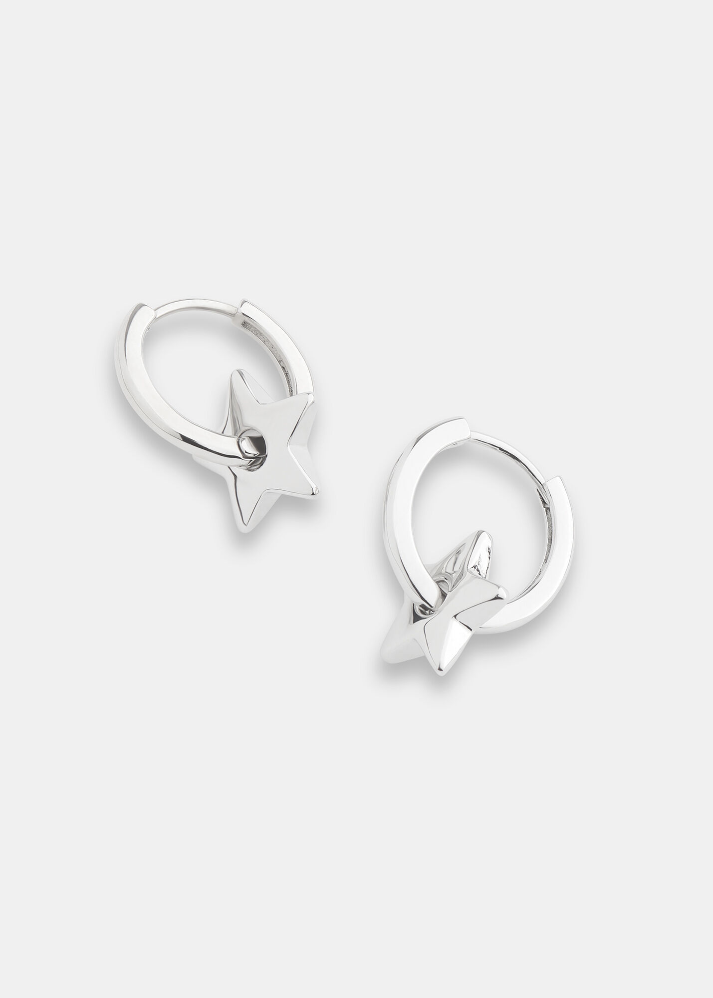 Star huggie hoop earrings top