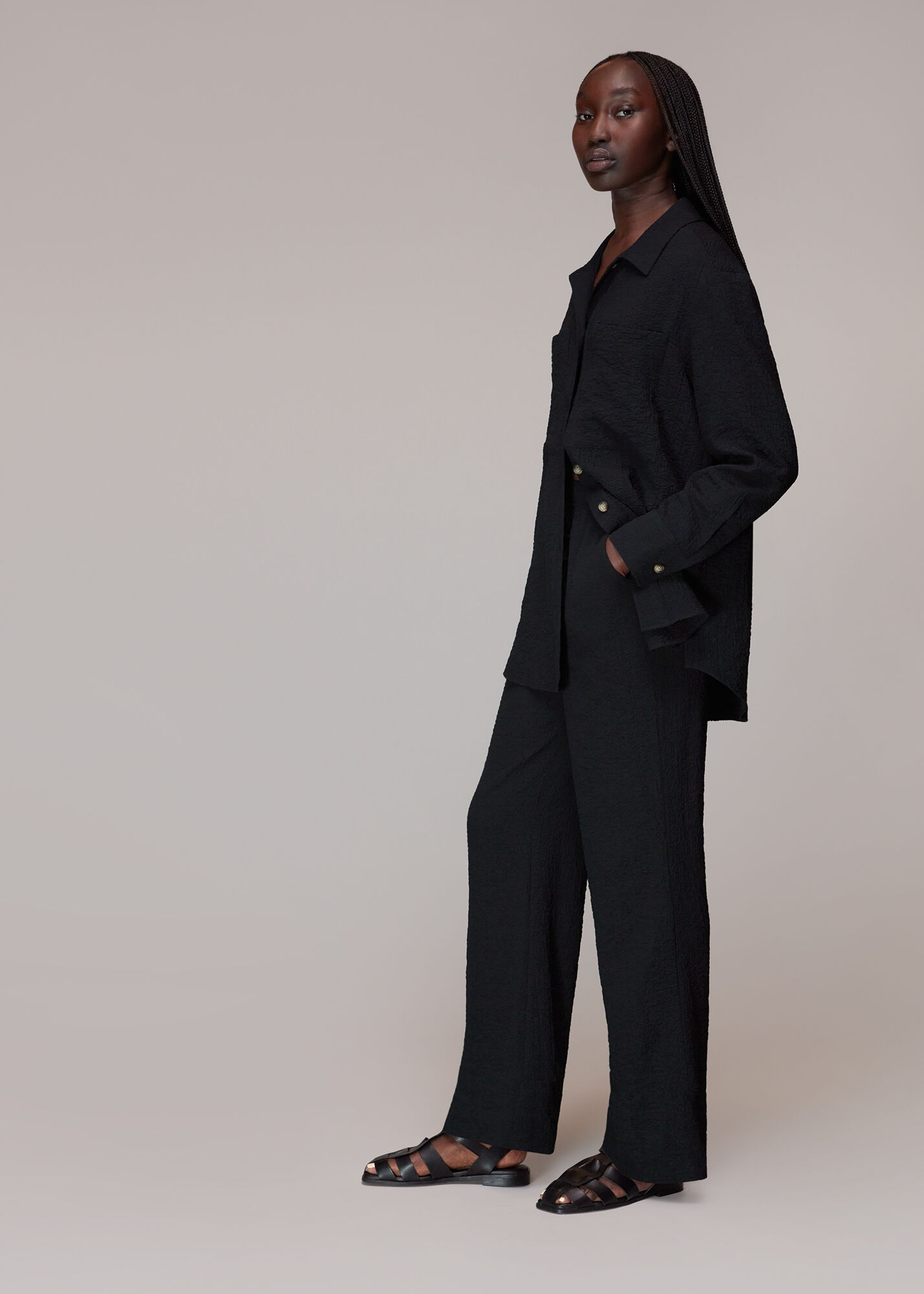 Black crinkle store trousers