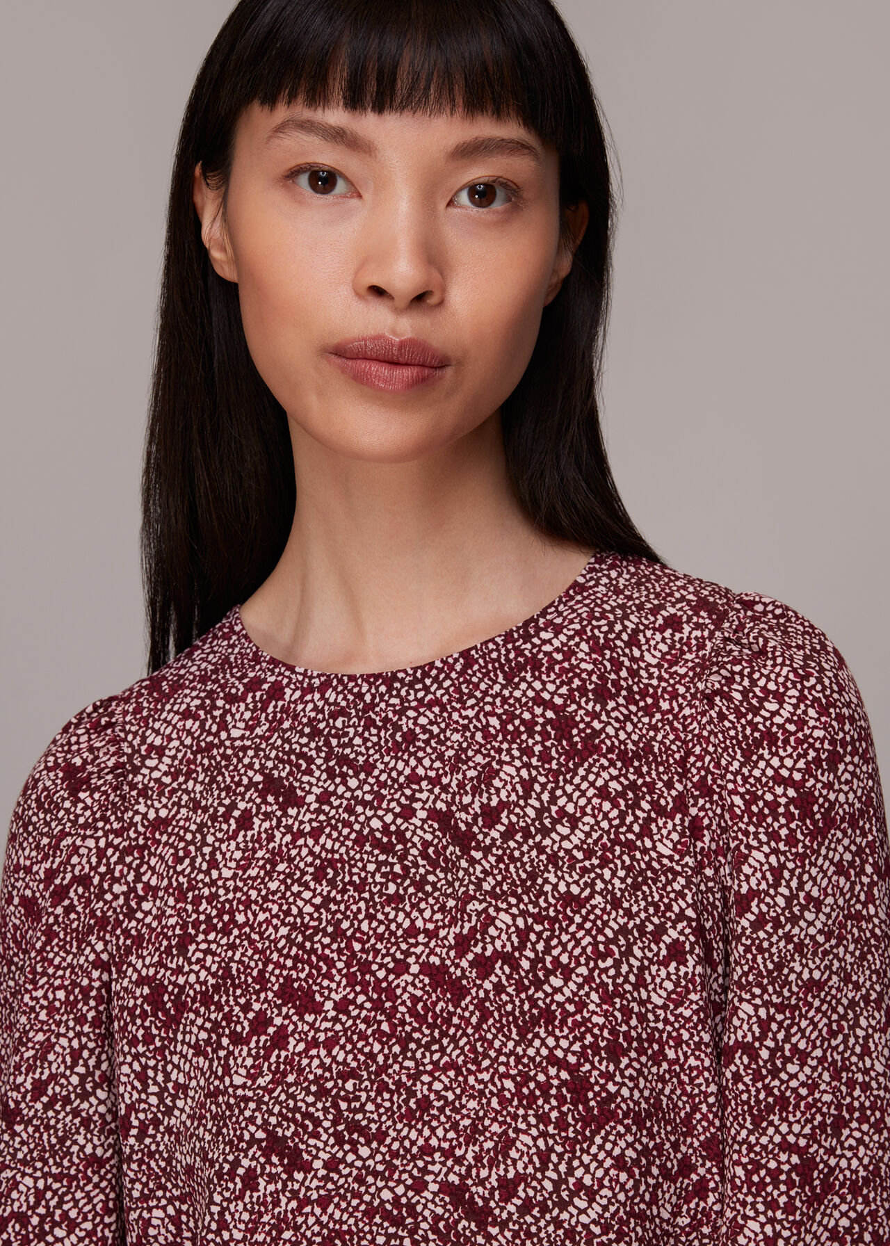 Rough Weave Cut Out Peplum Top