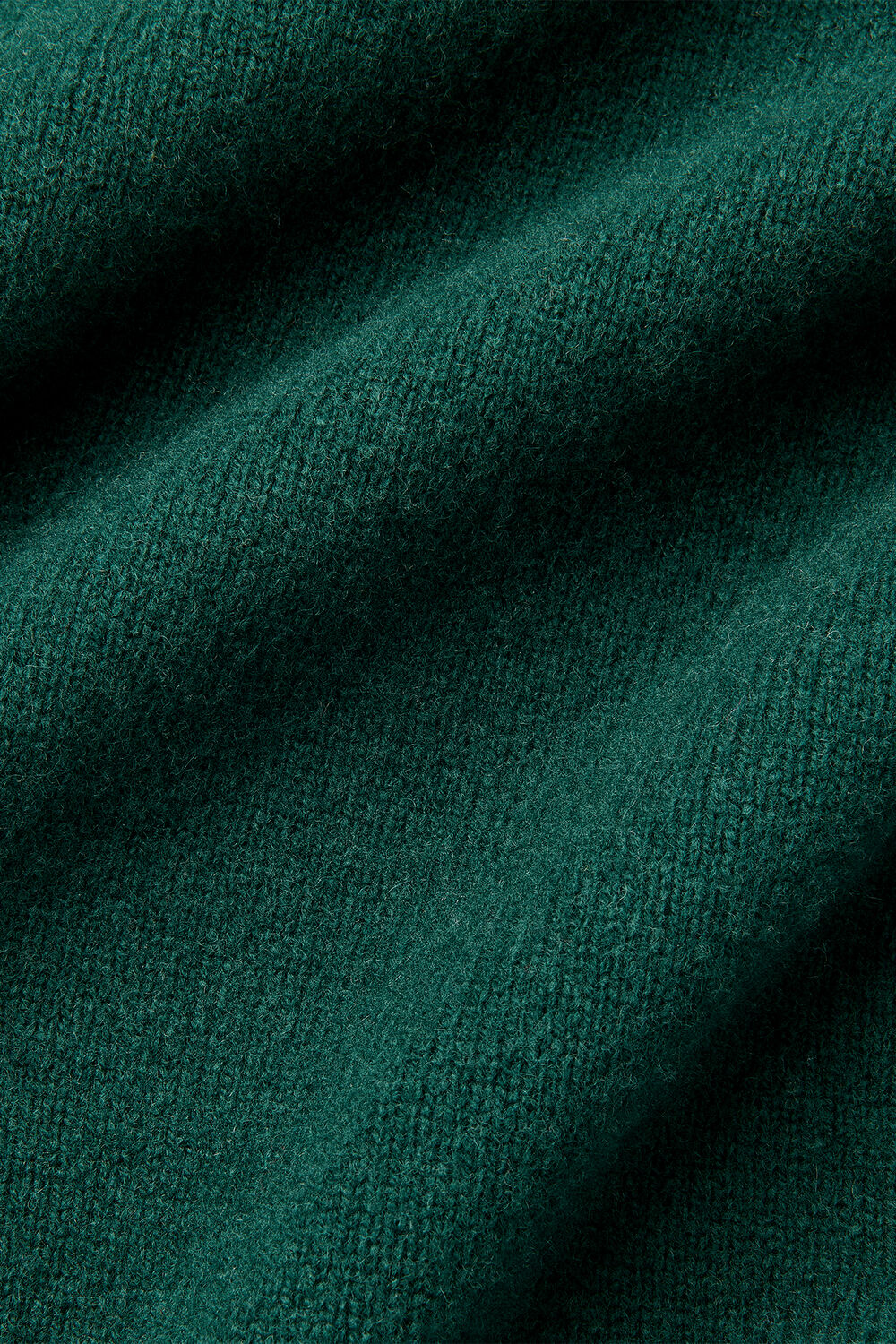 Wool Roll Curved Hem Knit