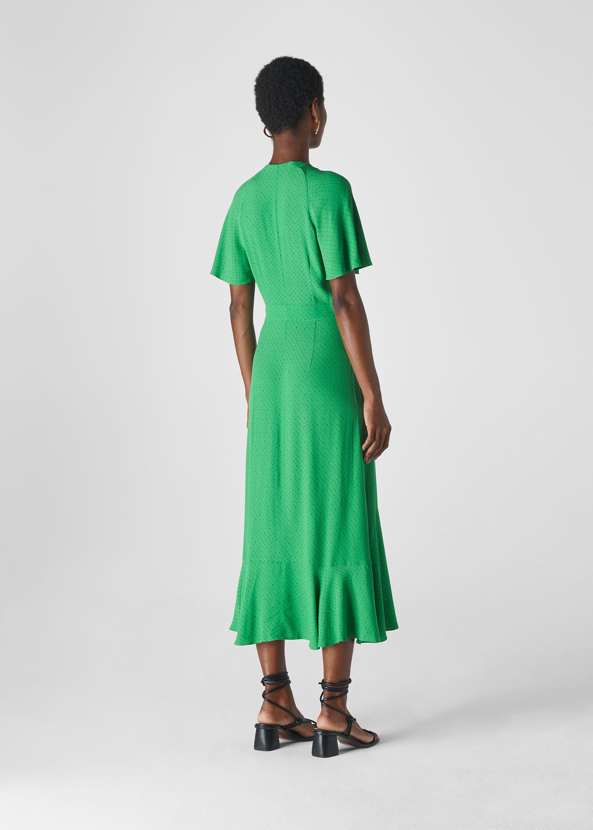 Green spotty dress shop