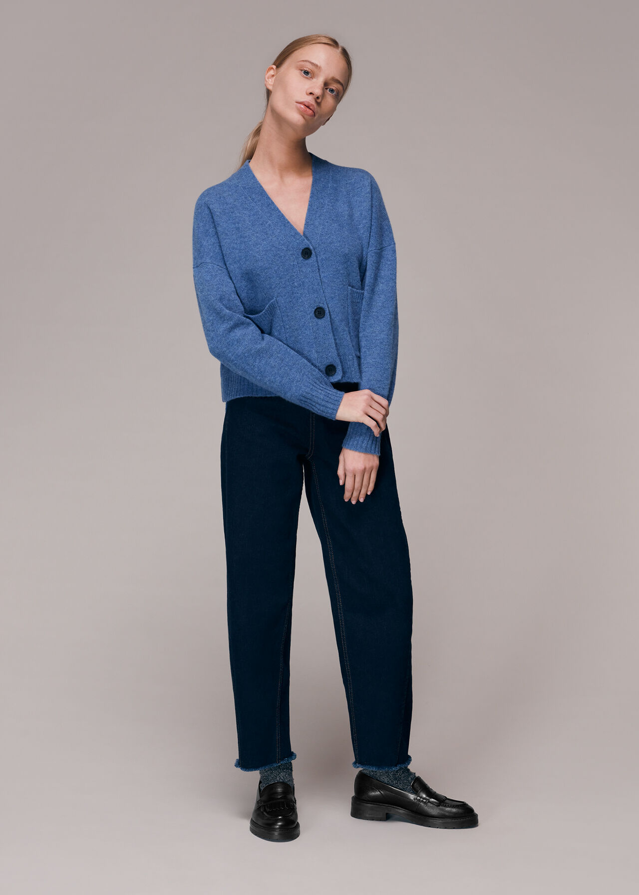 WornOnTV: Emily's turquoise blue cardigan and printed pleated mini