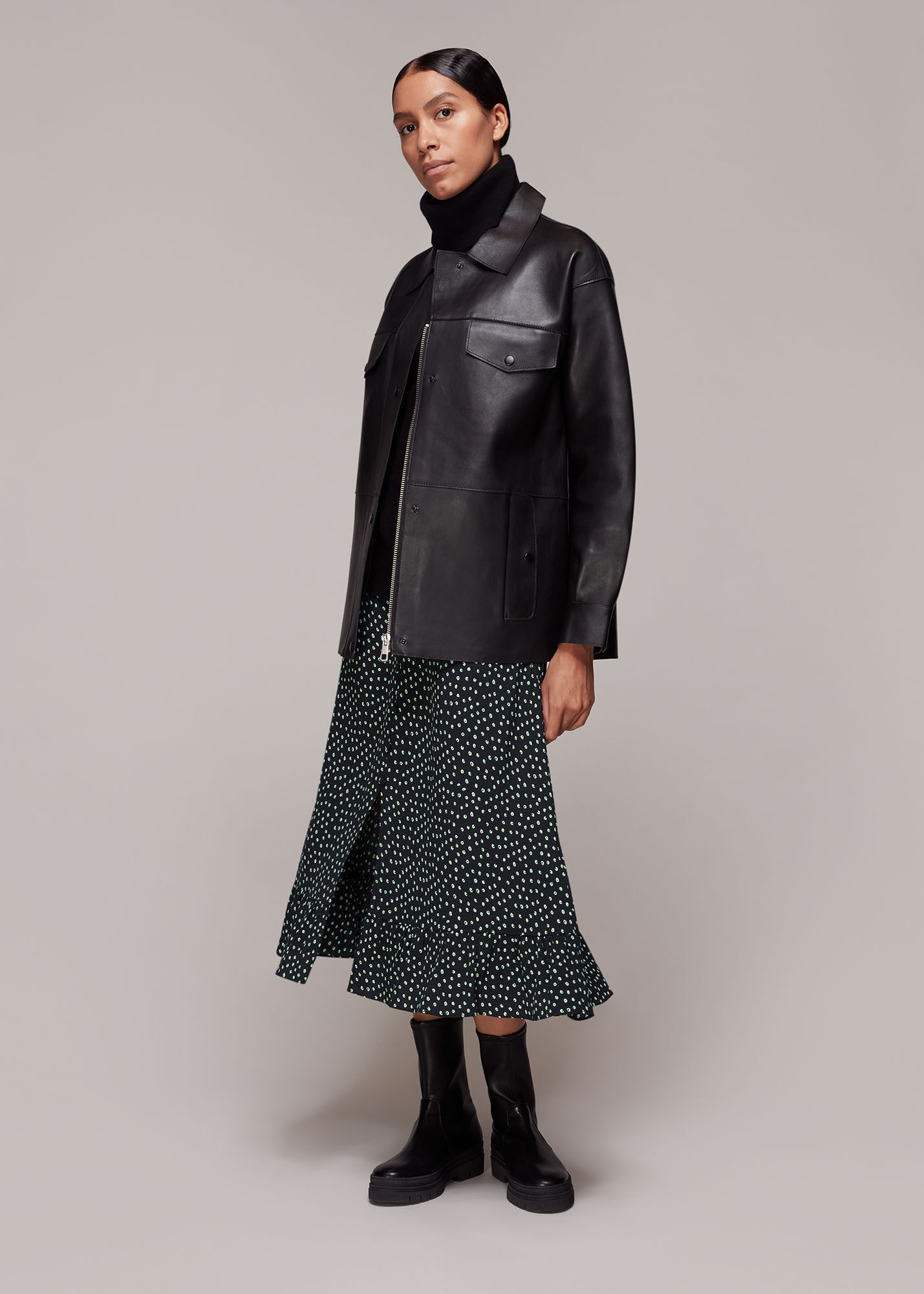 Black skirt with buttons down the store front