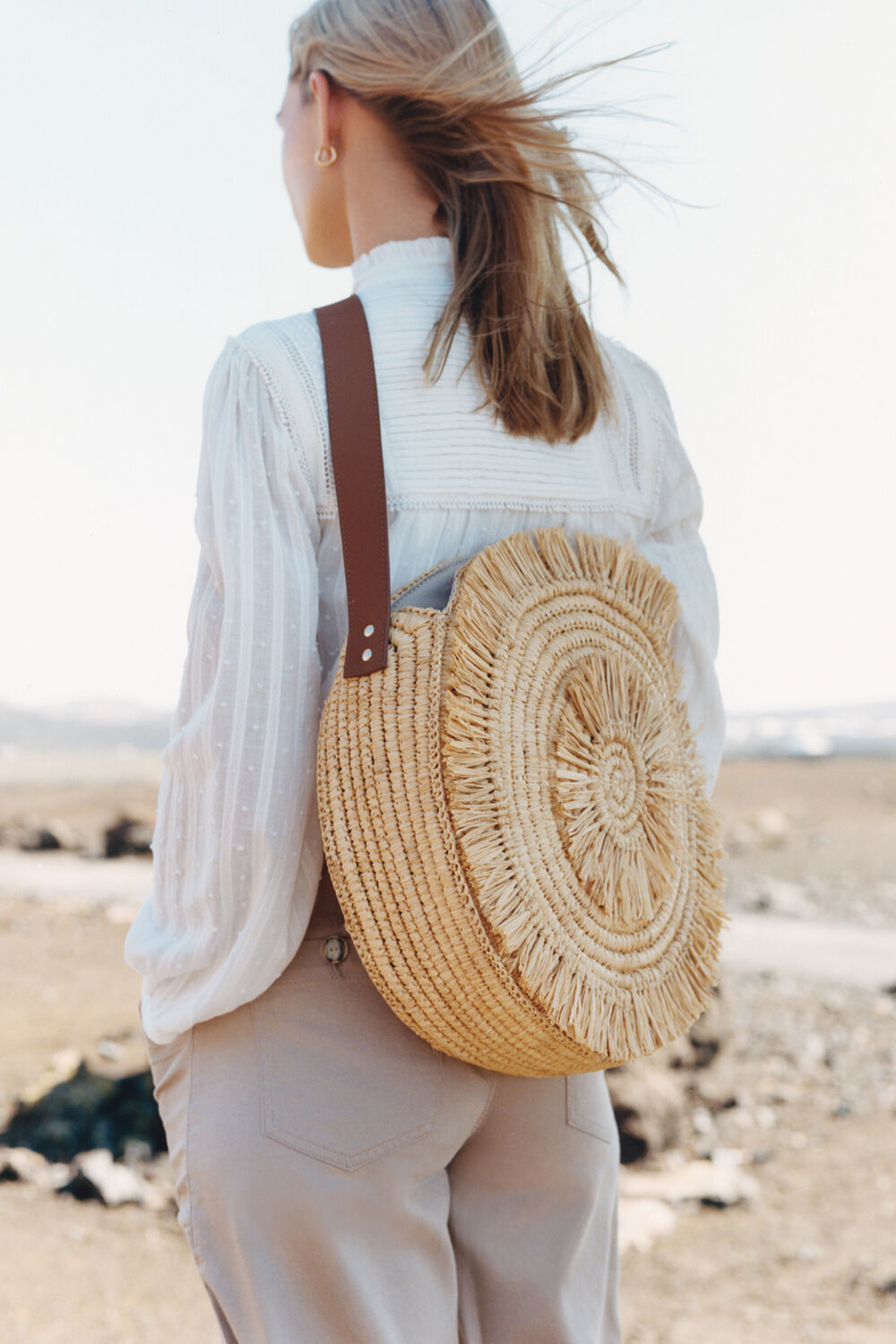 Lottie Round Straw Fringe Tote