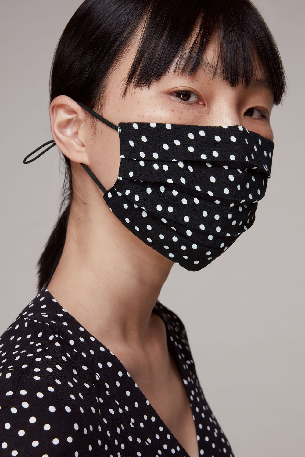 Black Irregular Spot Face Covering