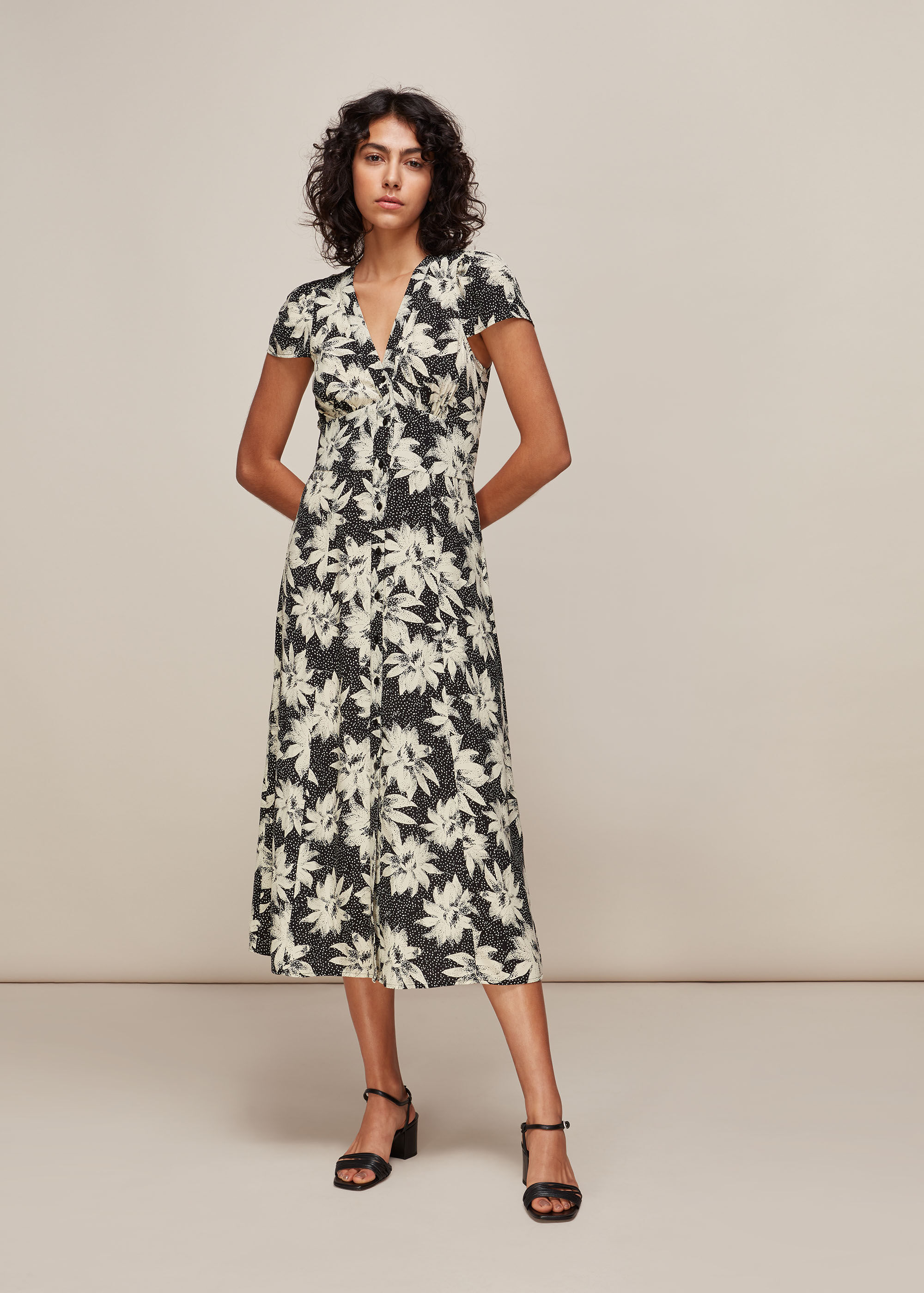 Starburst sheath dress top