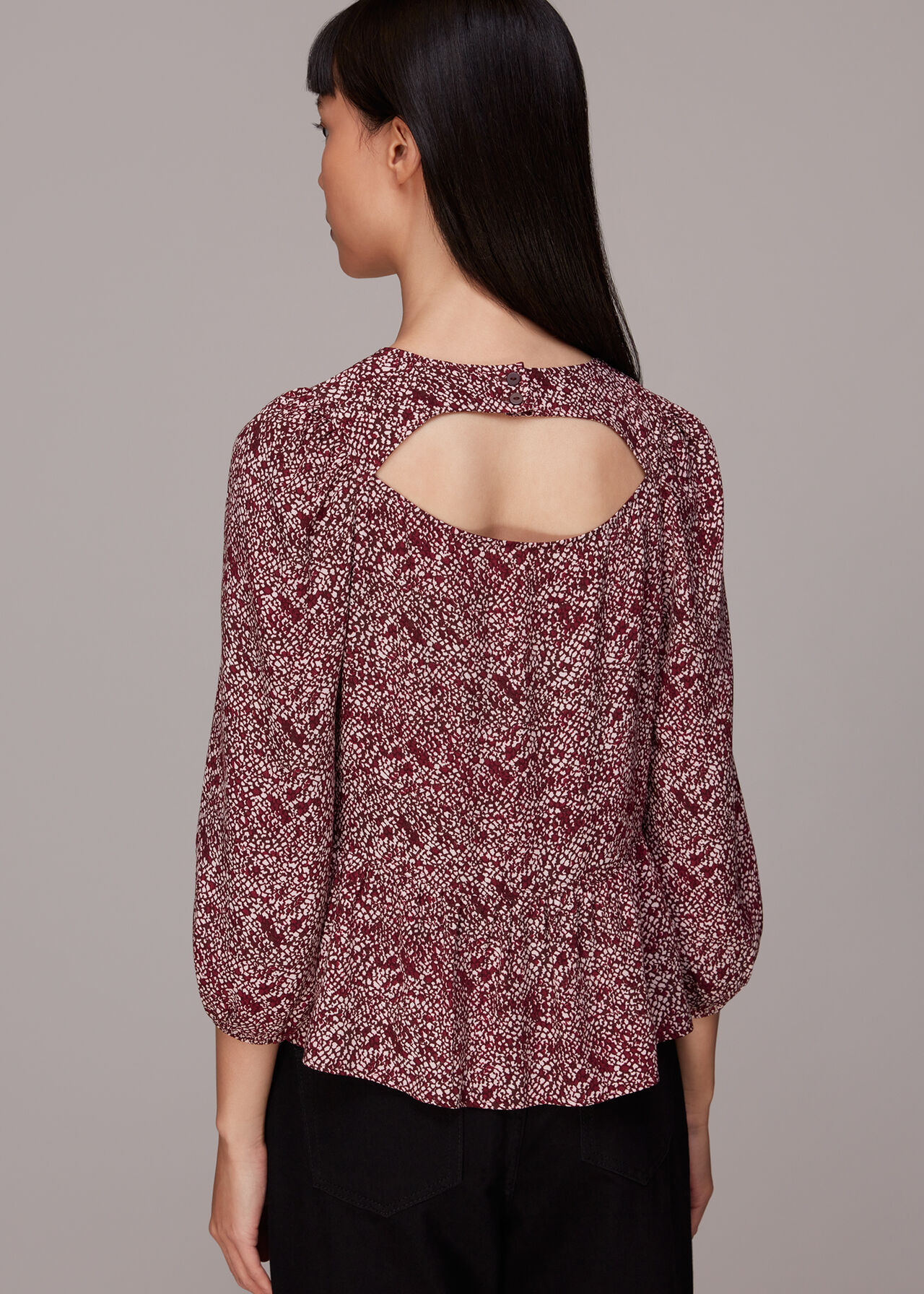 Rough Weave Cut Out Peplum Top
