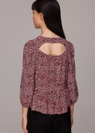 Rough Weave Cut Out Peplum Top