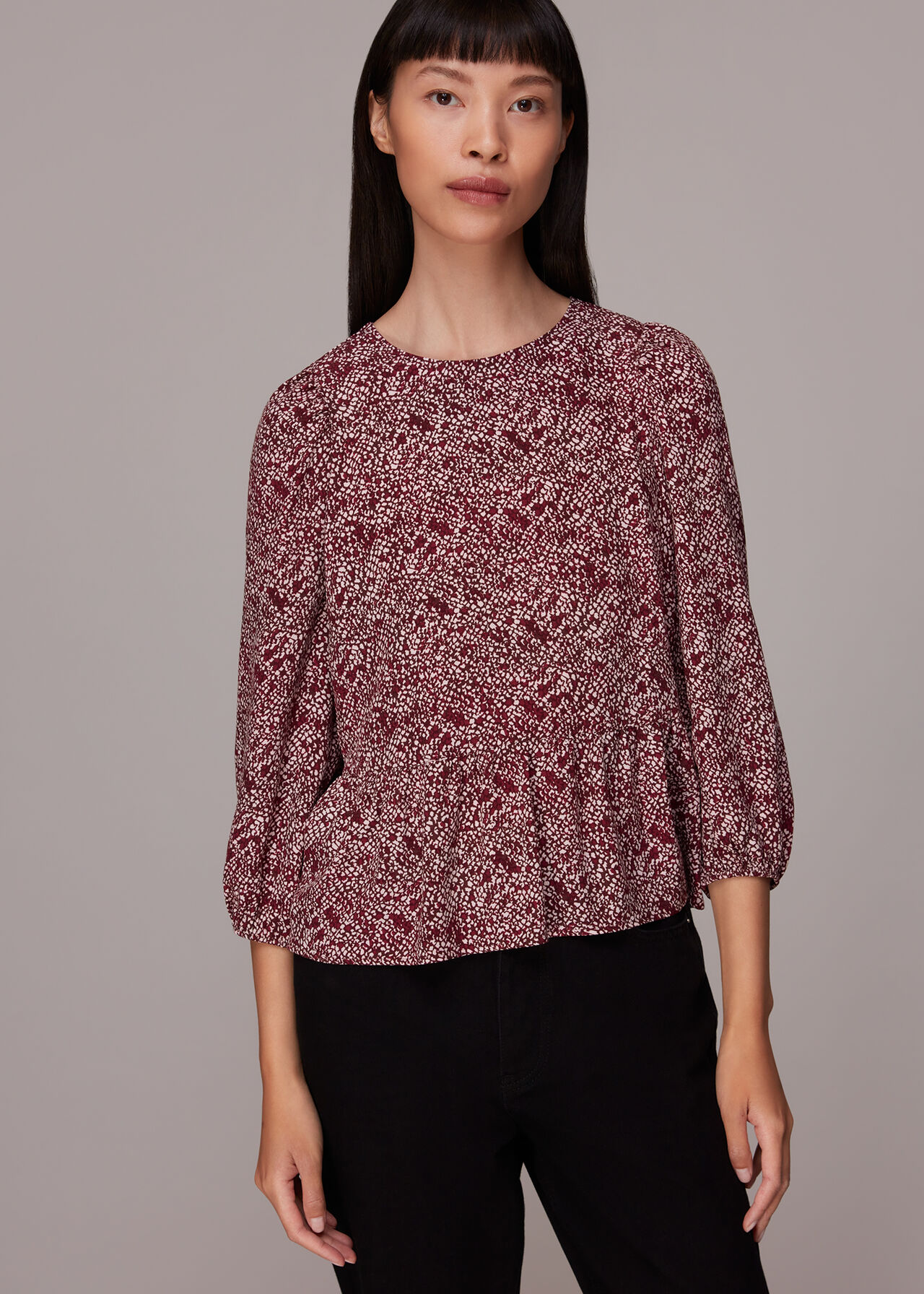 Rough Weave Cut Out Peplum Top