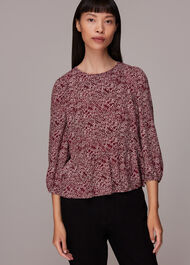 Rough Weave Cut Out Peplum Top