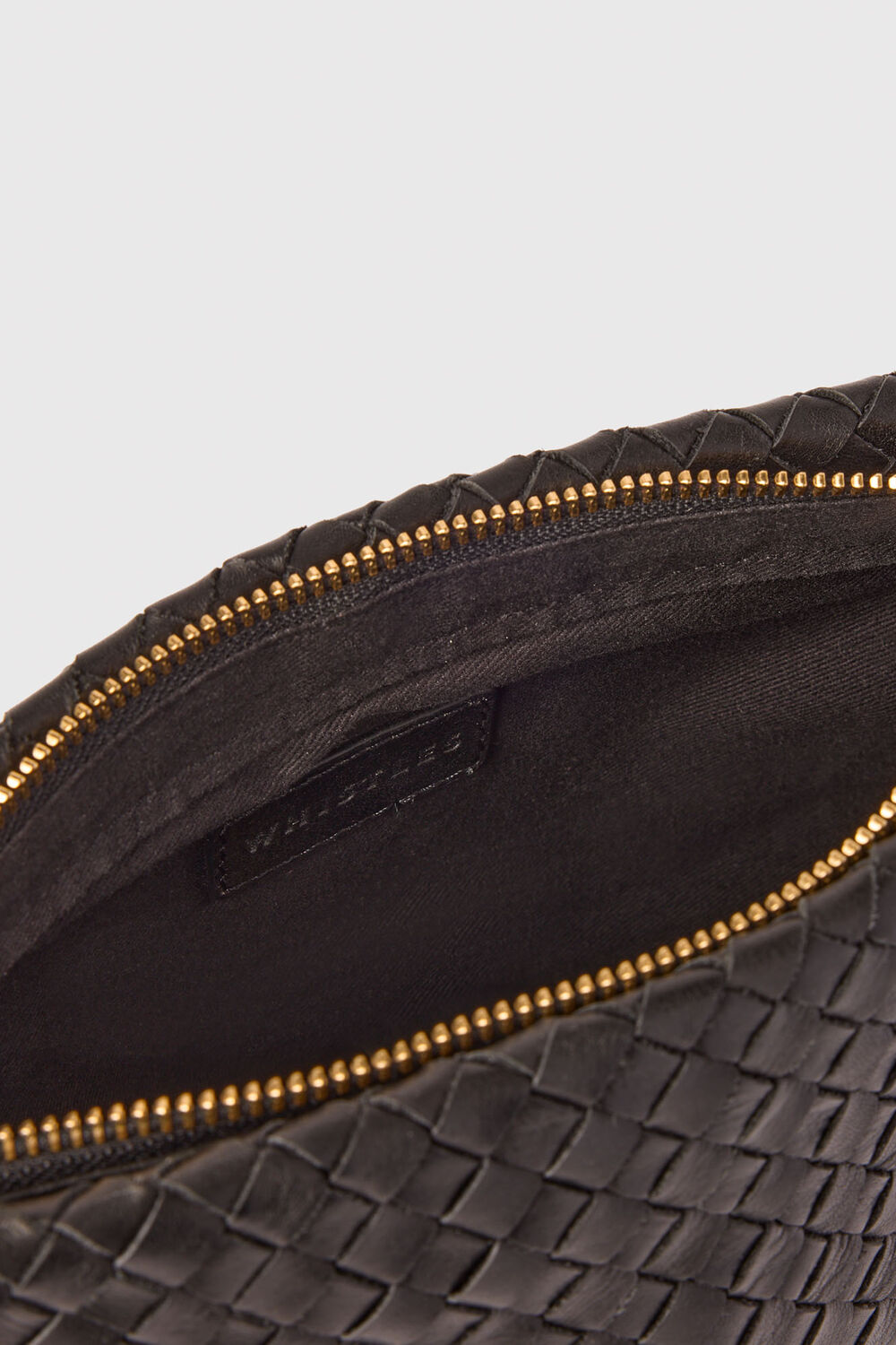 Black Avah Woven Zip Clutch
