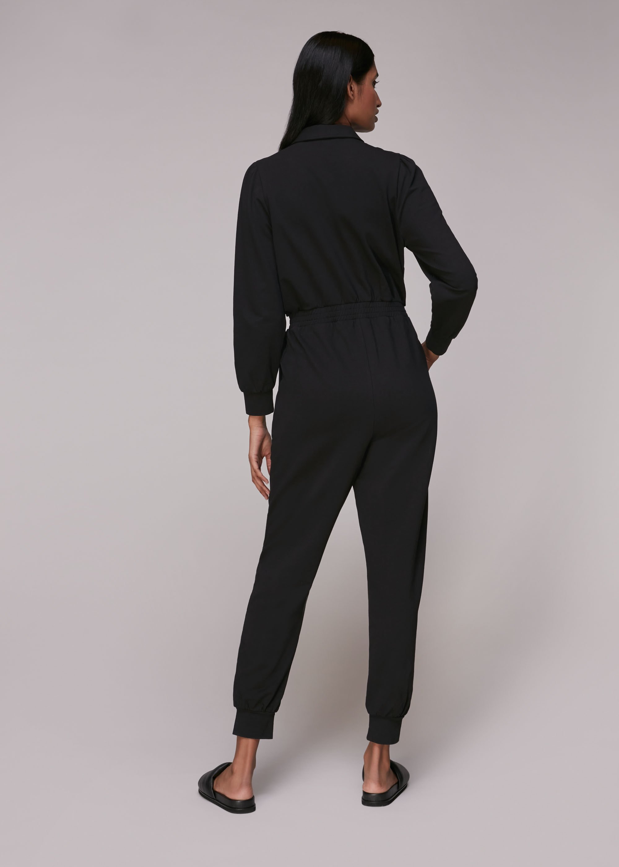 Black jumpsuit with shop zip at front
