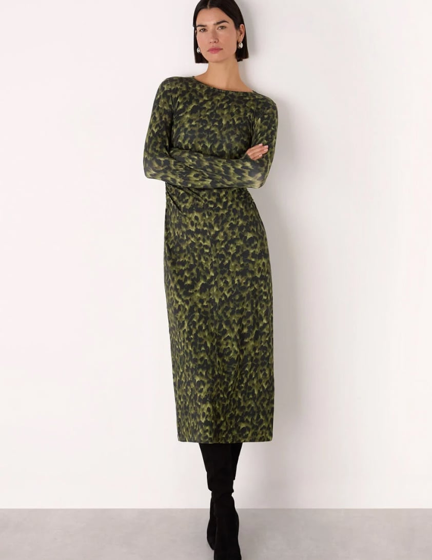 woman wearing funnel neck jumpers