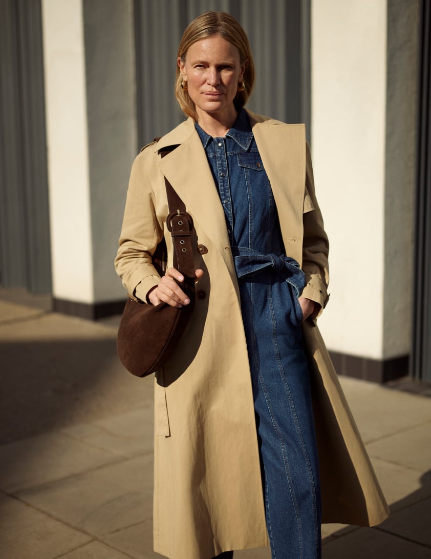 Woman wearing a trench coat