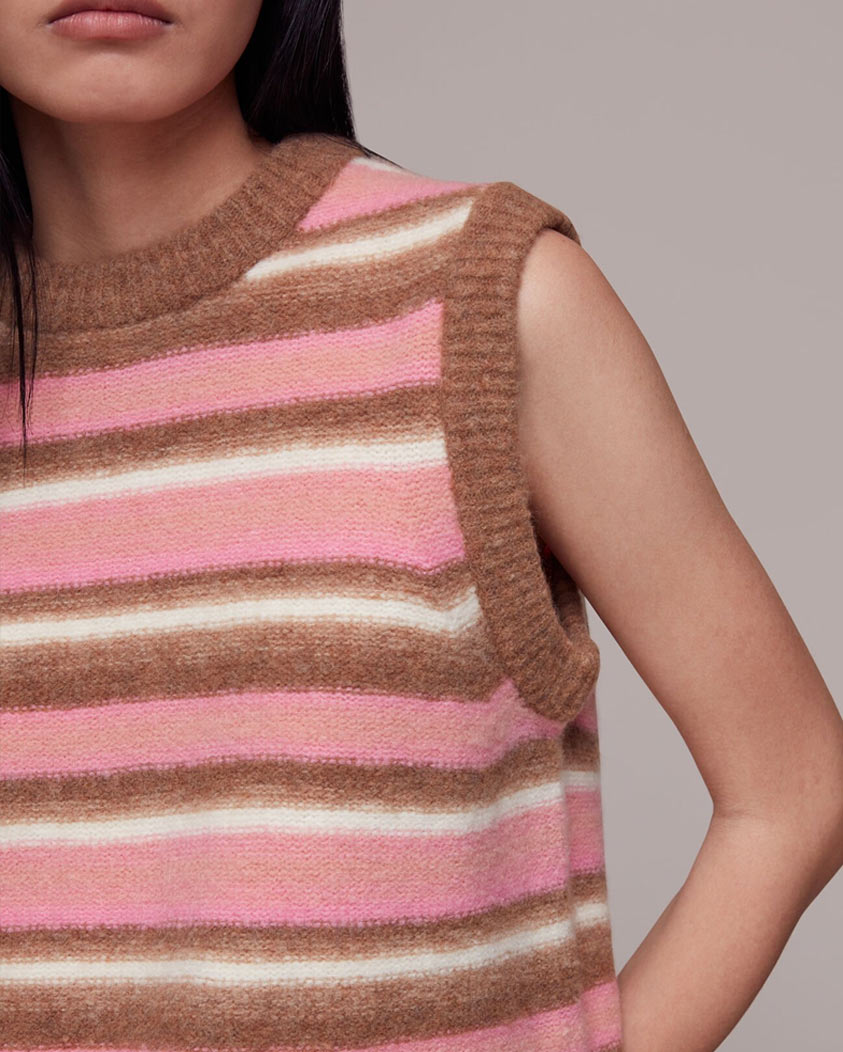 woman wearing a stripe knitted vest