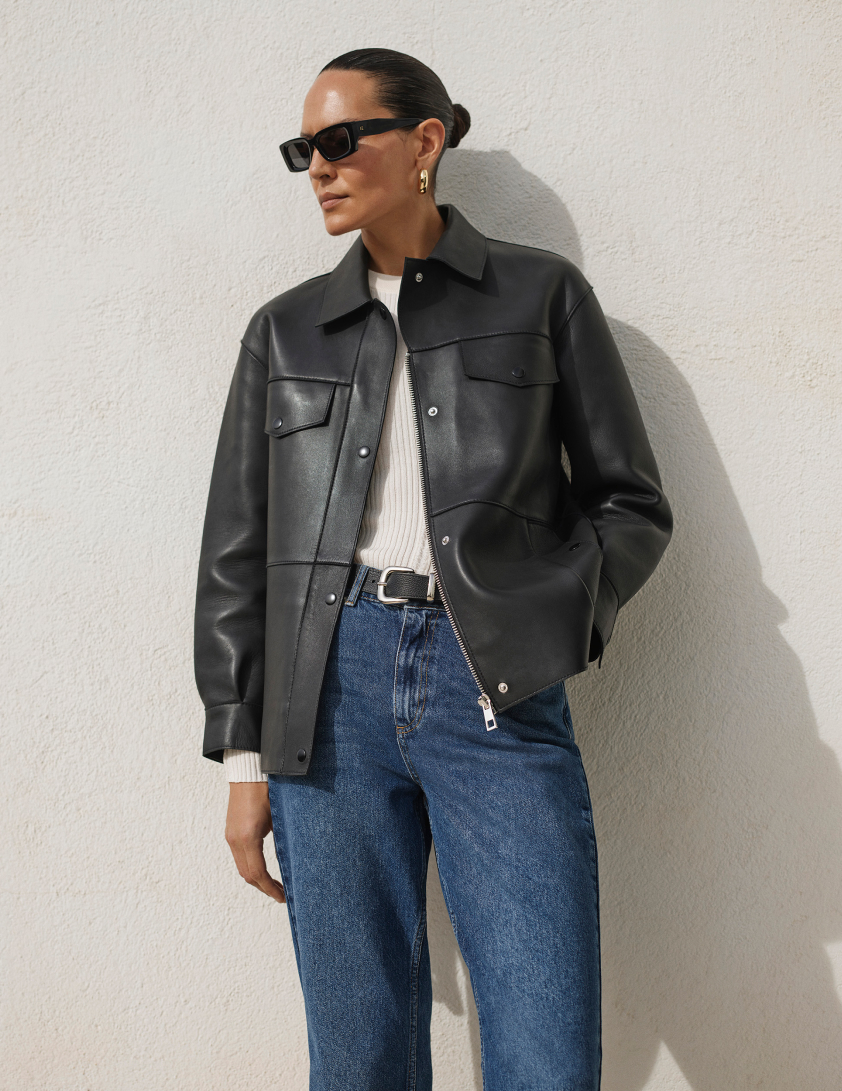 Woman wearing leather jacket
