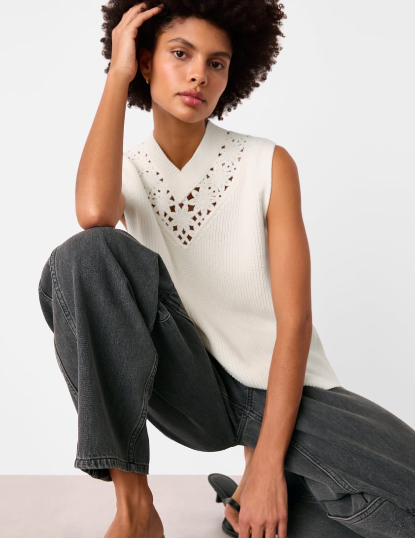 woman wearing white knitted tank