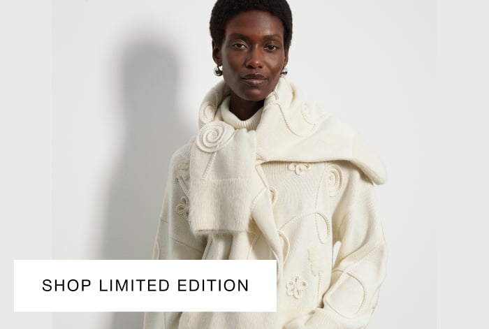 Woman wearing Whistles limited edition cream floral knit