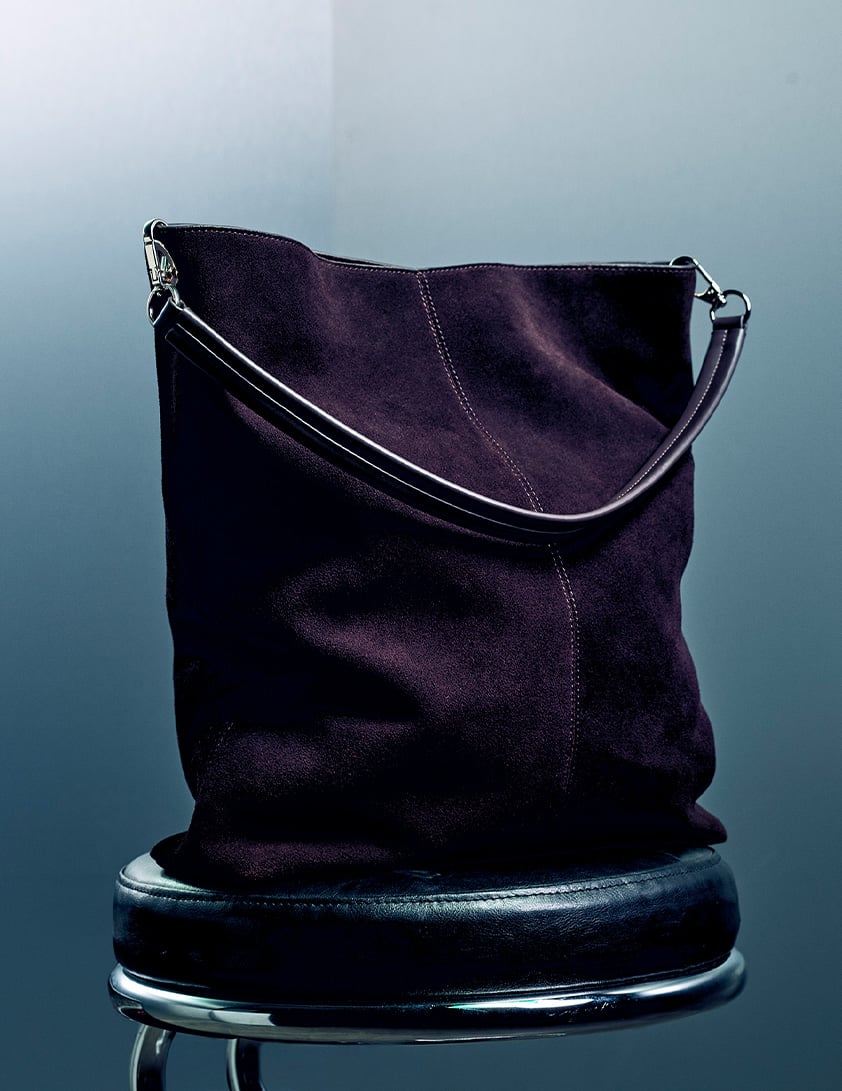 woman wearing shearling leather jacket with jeans