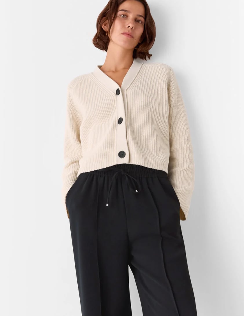 Woman wearing black pants