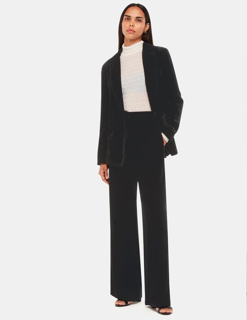 woman wearing black trousers