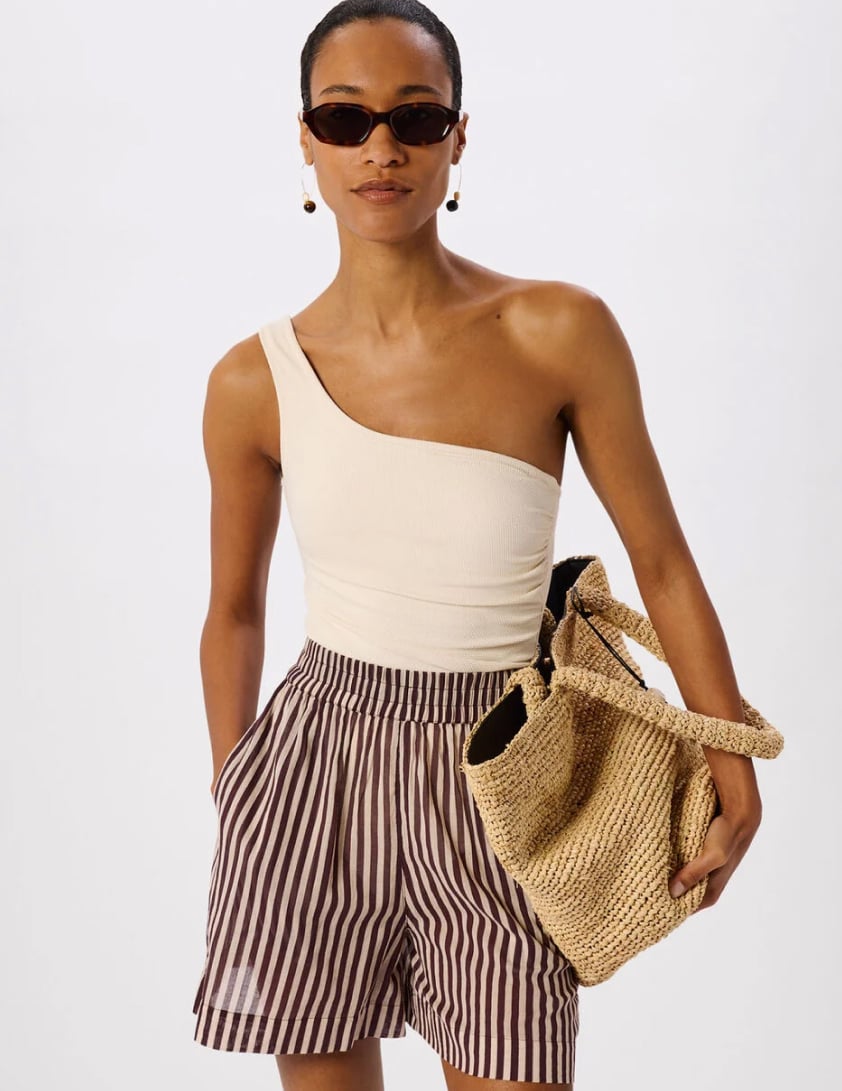 woman wearing shearling leather jacket with jeans