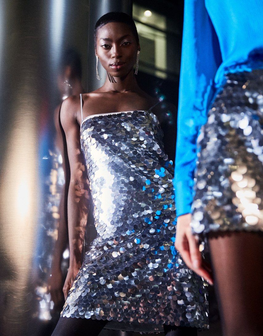 womnan wearing sparkly dress