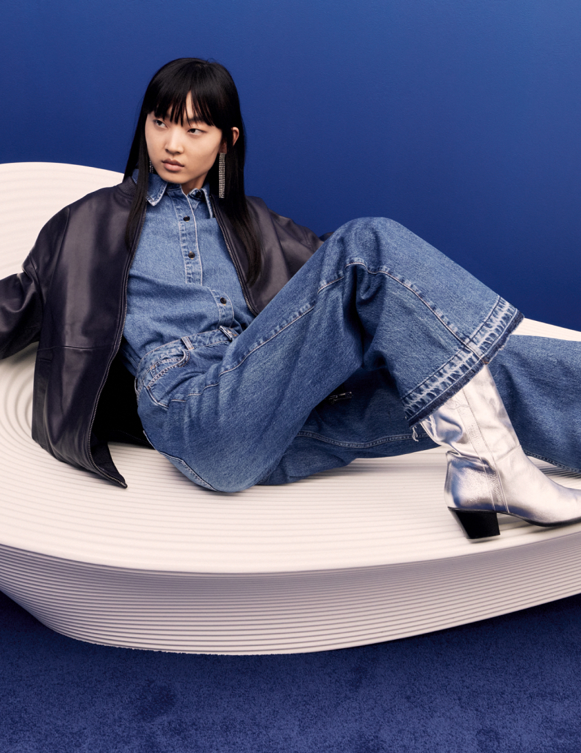 woman wearing blue jeans and blue denim shirt