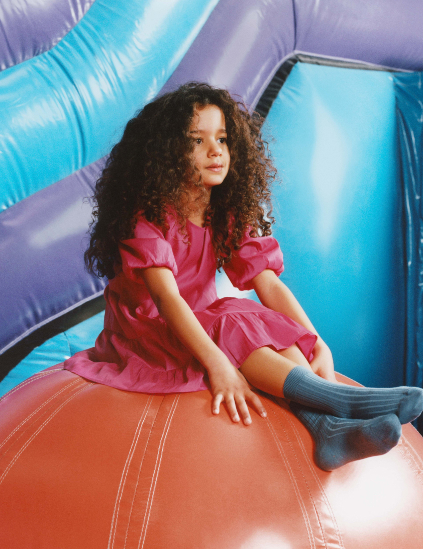girl wearing pink dress