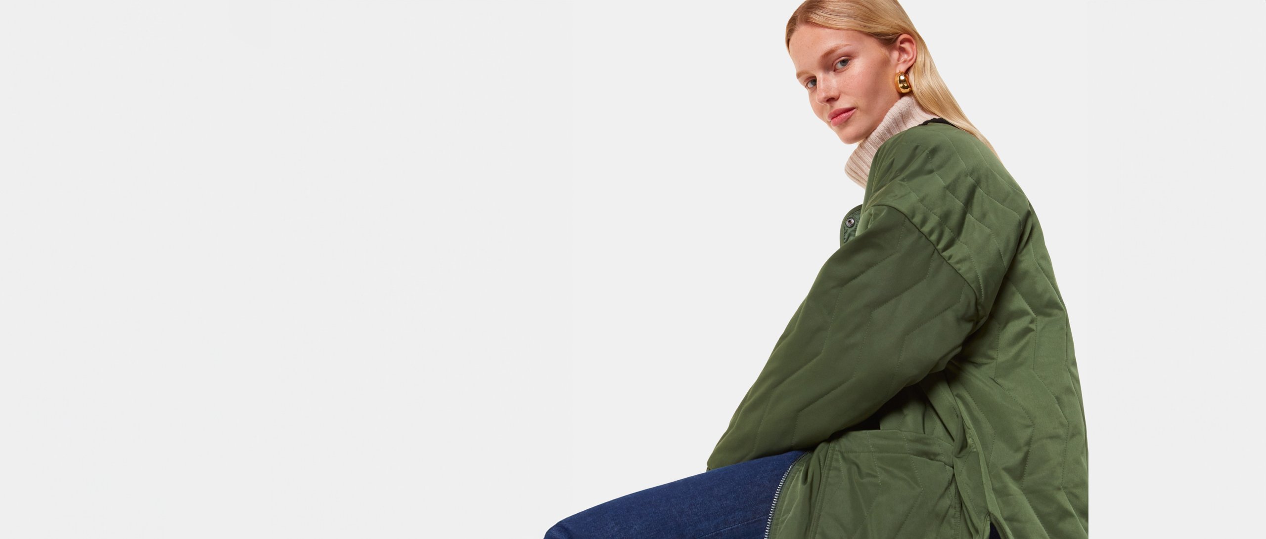 woman wearing green padded jacket