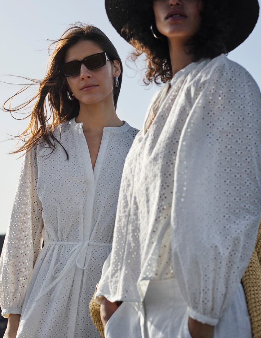 woman waerring white linen dress 