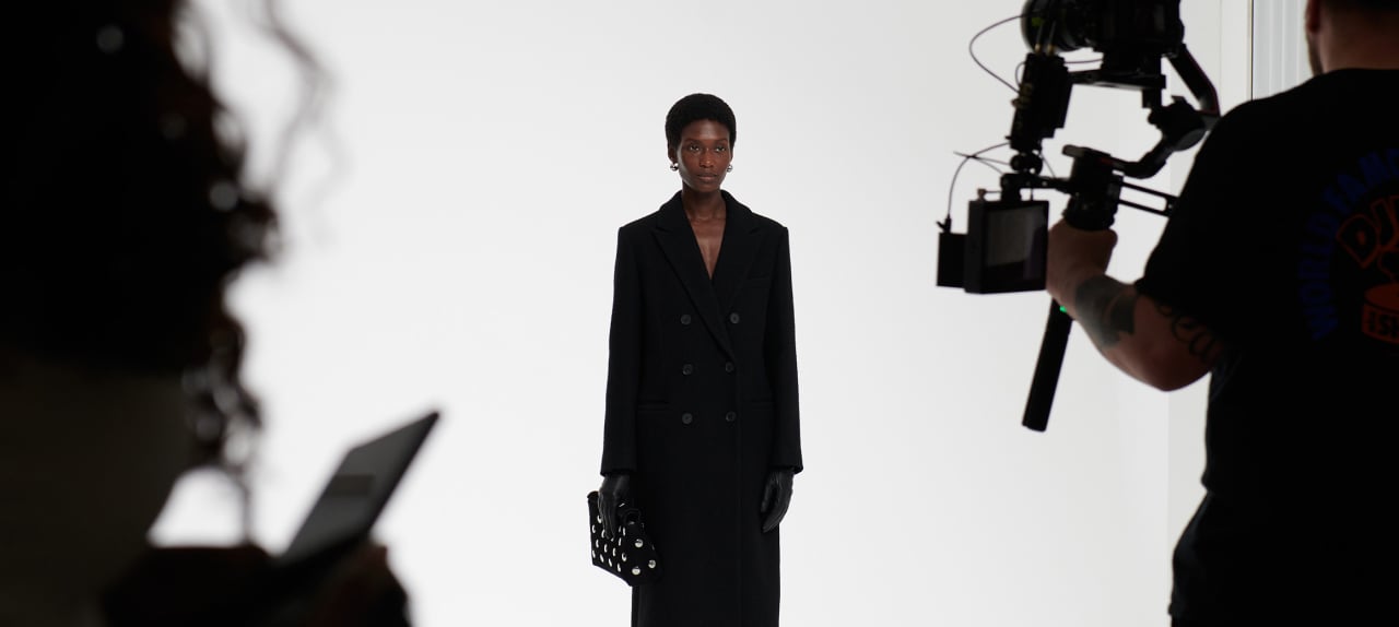woman wearing black leather coat
