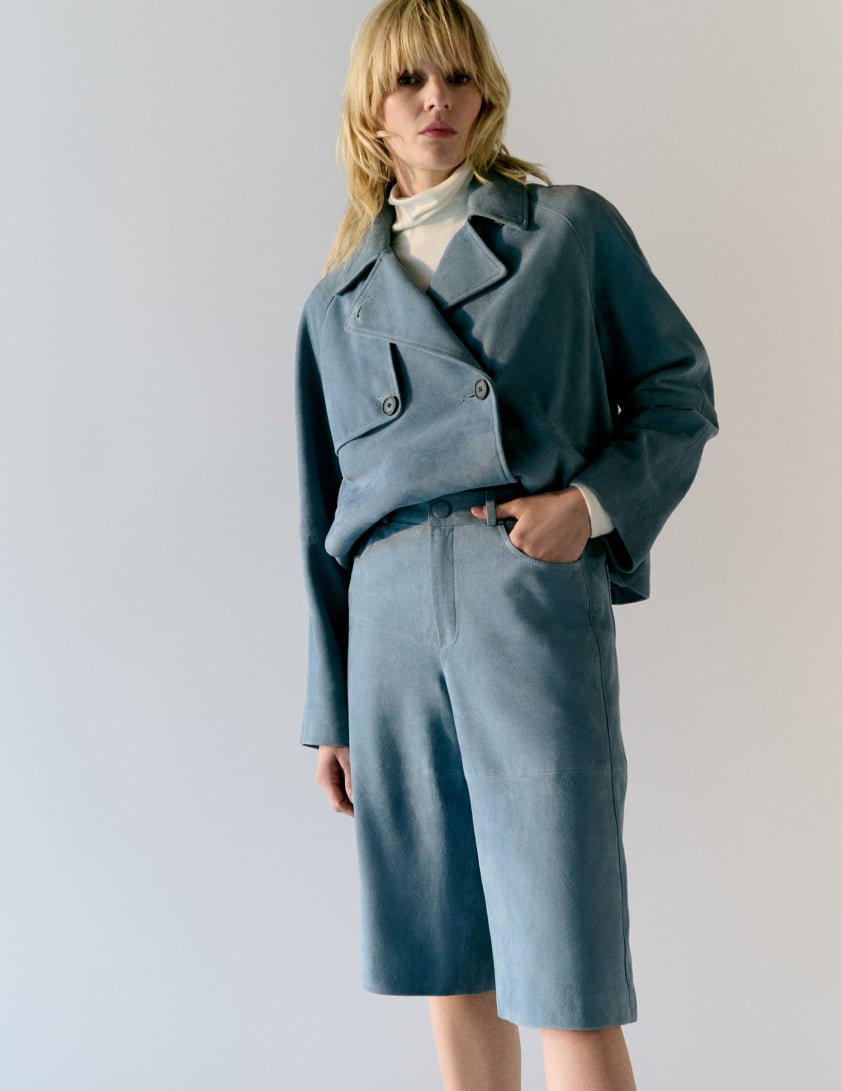 woman wearing shearling leather jacket with jeans