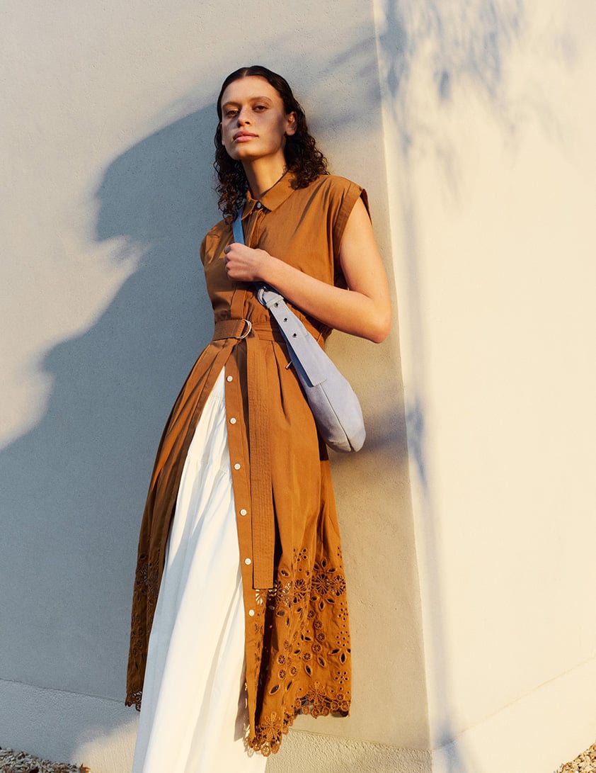 woman wearing shearling leather jacket with jeans