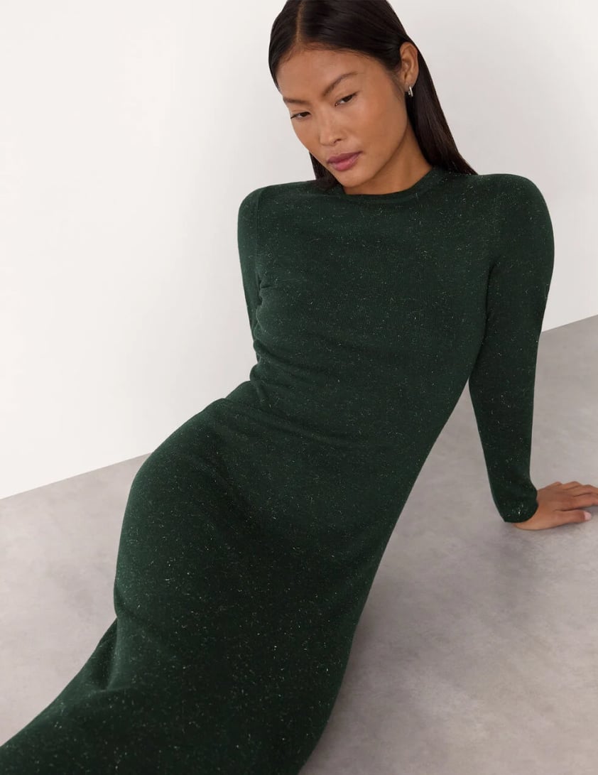 woman wearing black leather boots