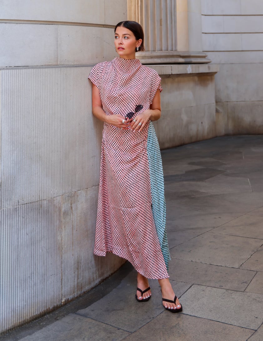 Model wearing a brown floral short sleeve midi dress