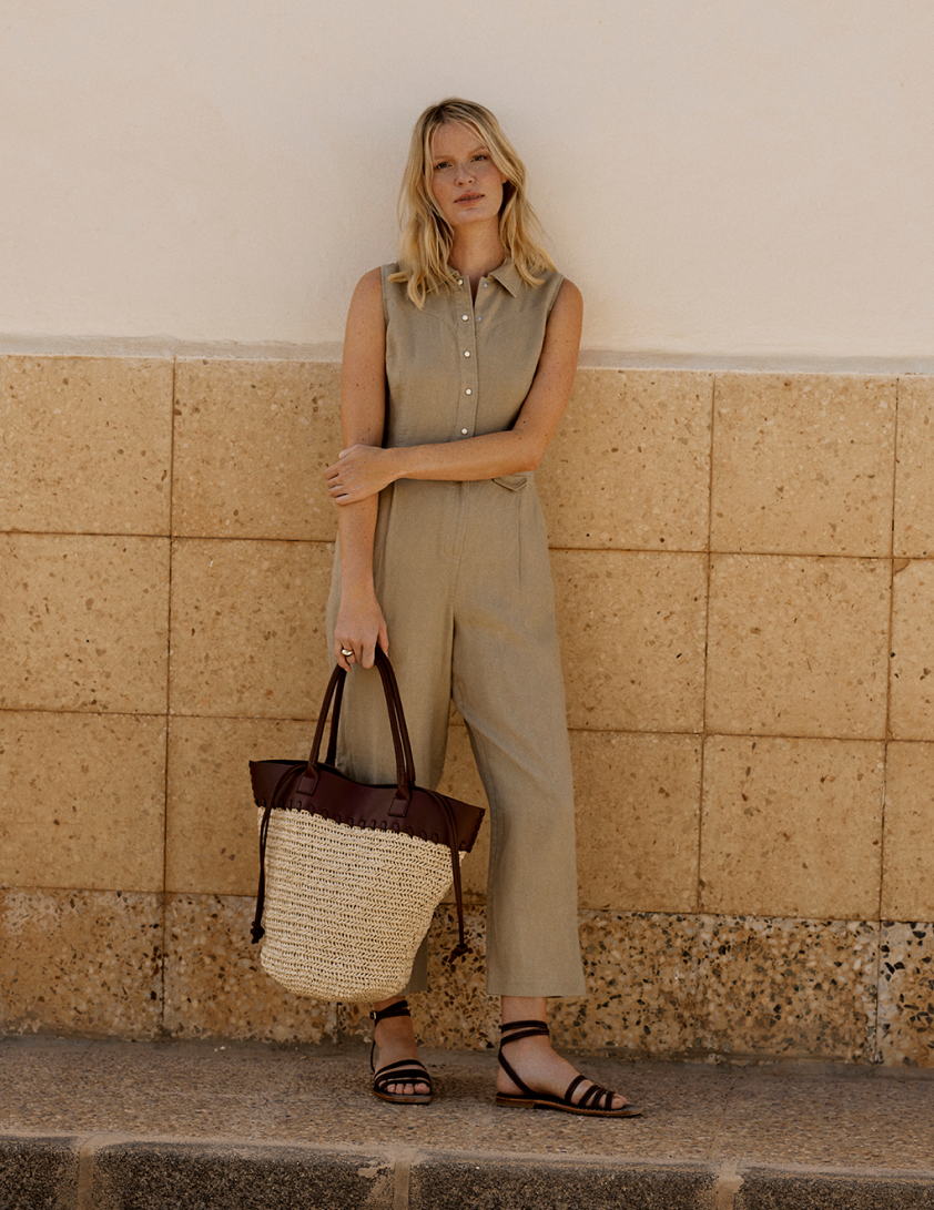 Woman wearing nutural linen jumpsuit
