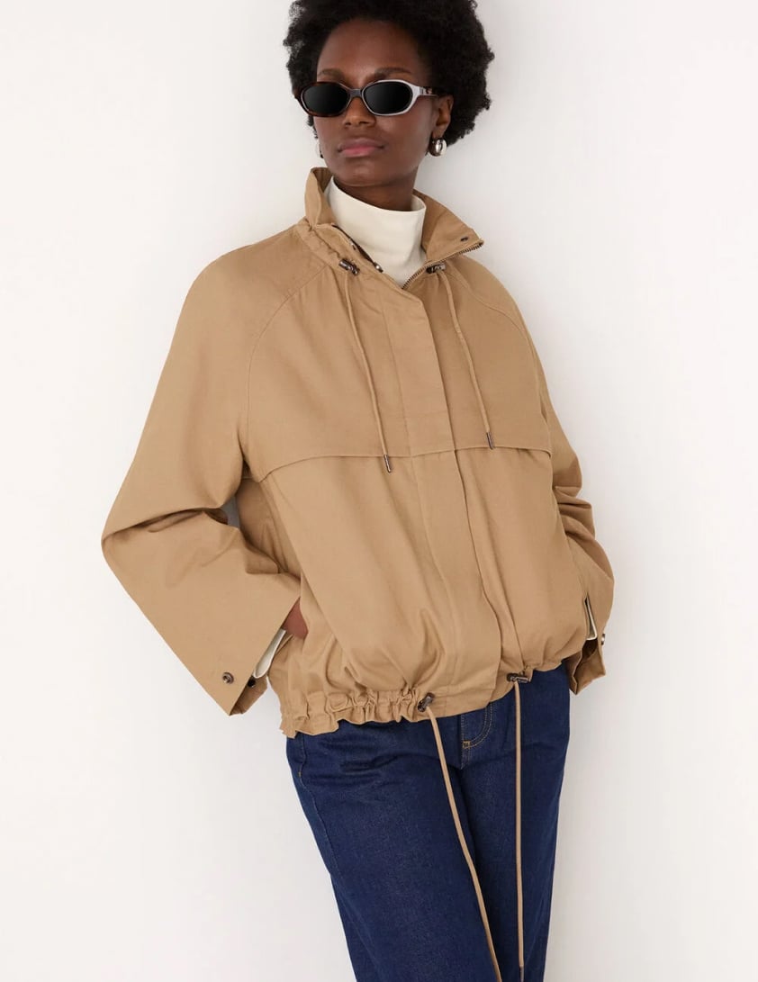 woman wearing shearling leather jacket with jeans