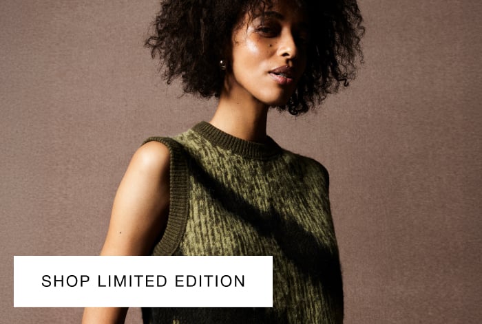 Woman wearing Whistles limited edition cream floral knit