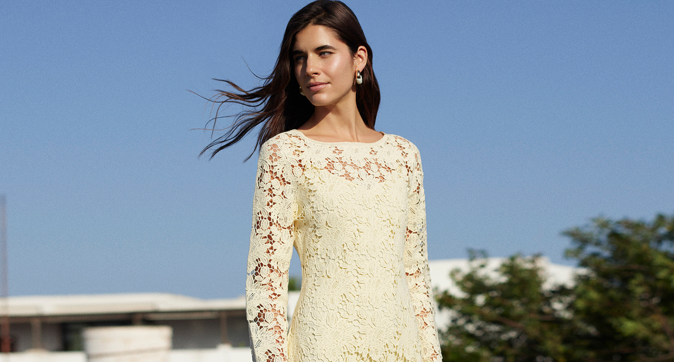 woman wearing cream dress
